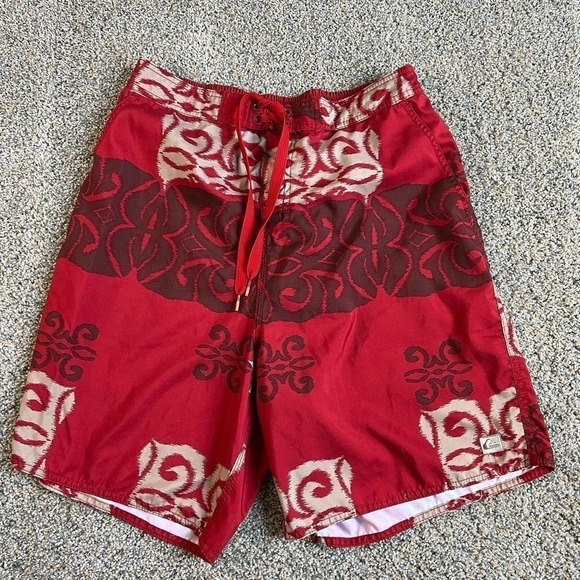 Quicksilver Red Hawaiian Swim Trunks Men's L Bathing Suit Tribal Polynesian - Picture 1 of 7